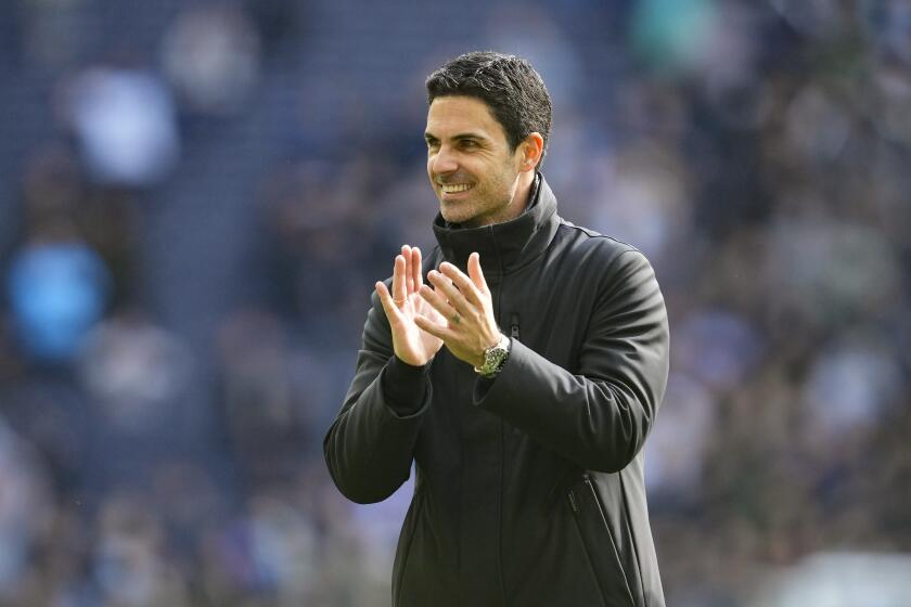 Arsenal's manager Mikel Arteta celebrates at the end of the English Premier League soccer match between Tottenham Hotspur and Arsenal at the Tottenham Hotspur Stadium in London, England, Sunday, April 28, 2024. (AP Photo/Kin Cheung)
