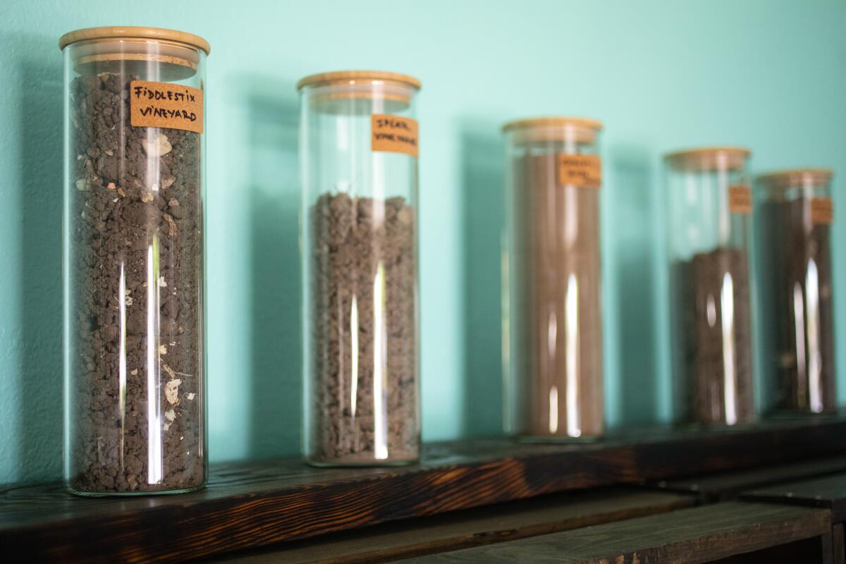 A collection of soil from local vineyards is displayed at Camins 2 Dreams in Lompoc. 