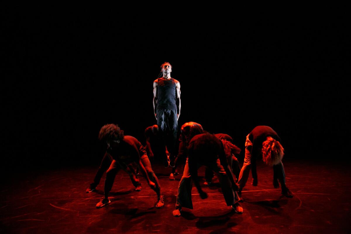 Julio Rocha jumps in the air as he and fellow dancers from Companhia Urbana de Dança run through "ID: Entidades" on Wednesday at the REDCAT in Los Angeles.