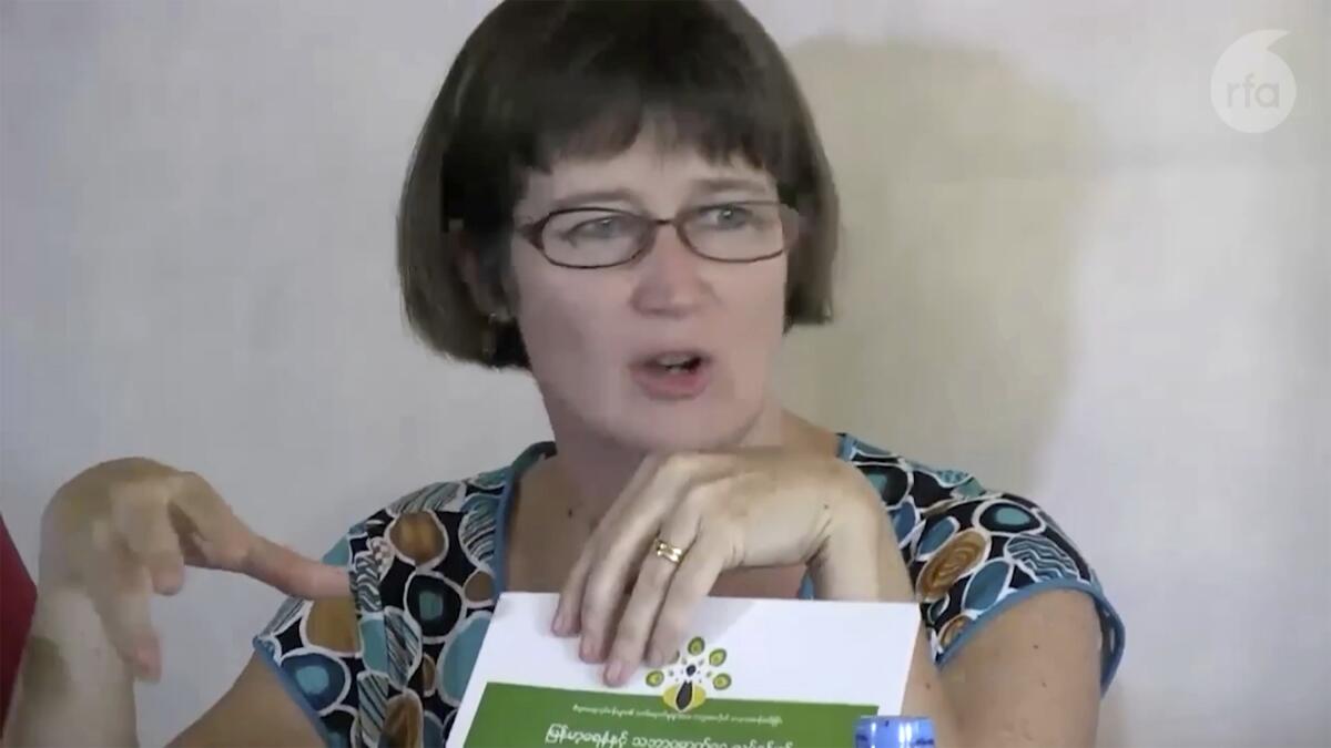In this image made from video by Radio Free Asia, former British Ambassador Vicky Bowman talks to media in Yangon, Myanmar, on Sept. 5, 2014. A court in Myanmar has sentenced the former British ambassador to the Southeast Asian nation to a year in prison for failing to register her residence, a diplomat who has been following her case said Friday, Sept. 2, 2022. (Radio Free Asia via AP)
