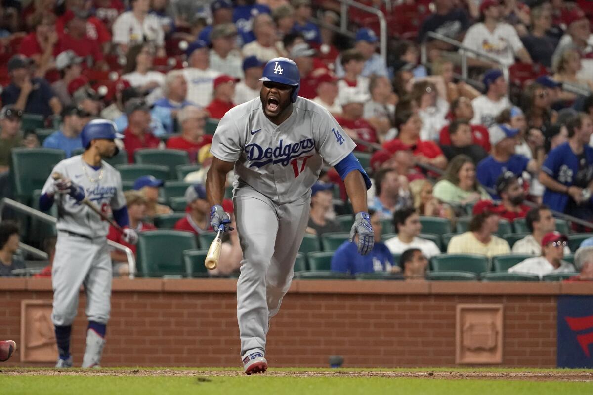 Dodgers' Hanser Alberto celebrates after hitting an RBI single during the ninth inning against the St. Louis Cardinals.