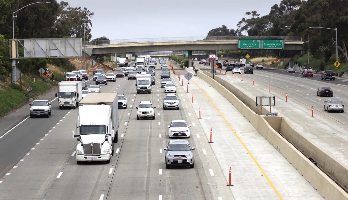 Freeway traffic as seen from the SR 78 overpass looking southbound and northbound.