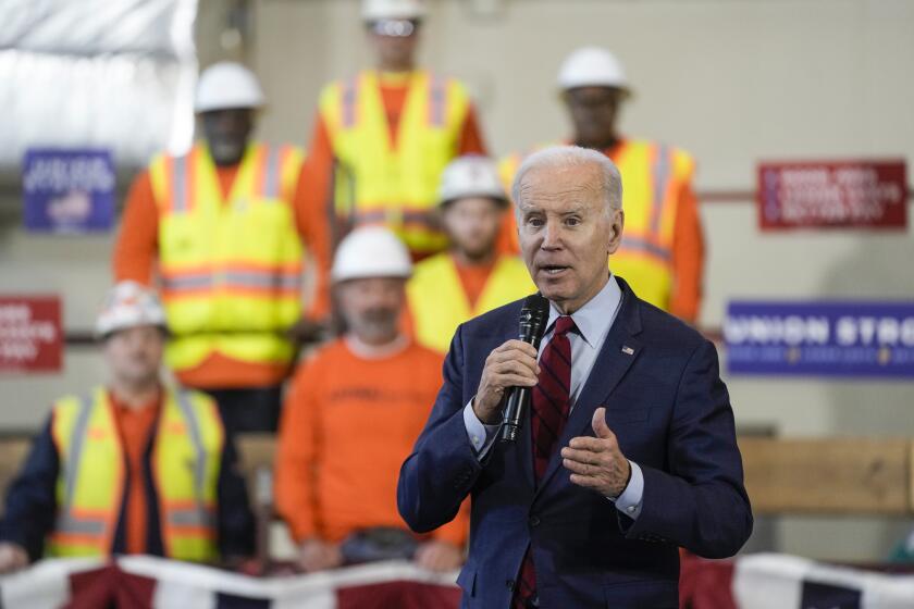 FILE - President Joe Biden delivers remarks on his economic agenda at a training center run by Laborers' International Union of North America, Feb. 8, 2023, in Deforest, Wis. The Biden administration on Friday, Sept. 29, is releasing a playbook on best practices for training workers — as the low 3.8% unemployment rate and years of underinvestment have left manufacturers, construction firms and other employers with unfilled jobs. (AP Photo/Morry Gash, File)