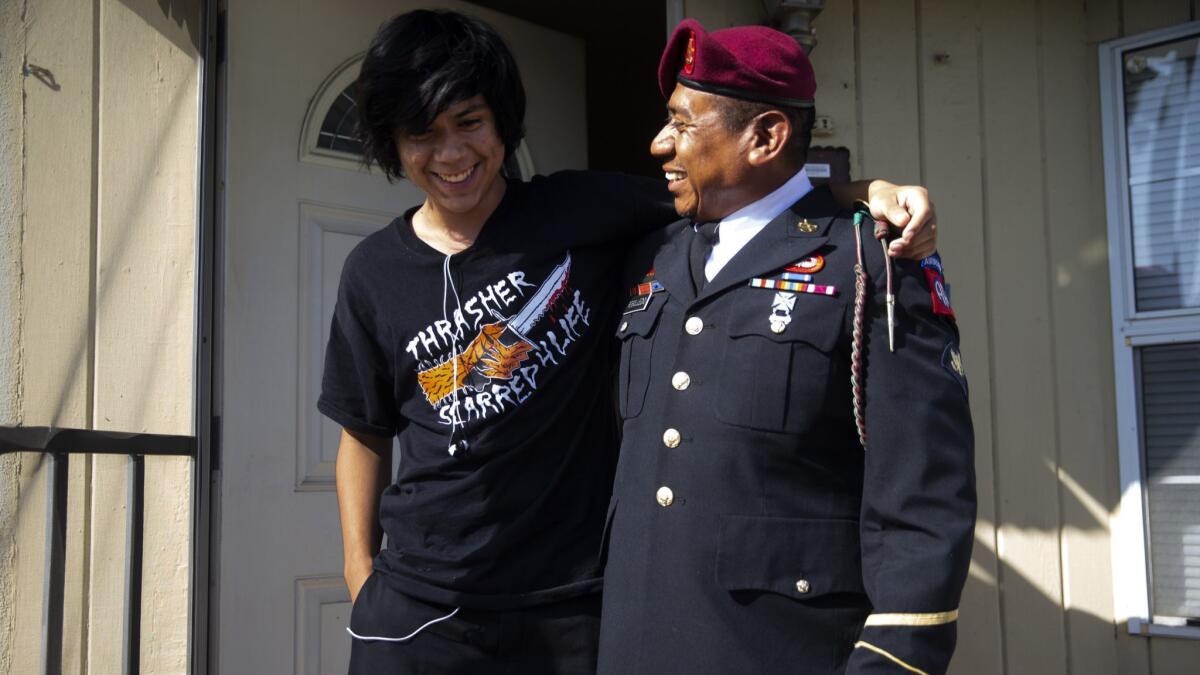 Derick Rebolledo, 18, shares a moment with his father, Fabian Rebolledo in Azusa. Rebolledo, an Army veteran, was deported to Mexico in 2010 and won a lengthy legal fight to return to the United Sates.