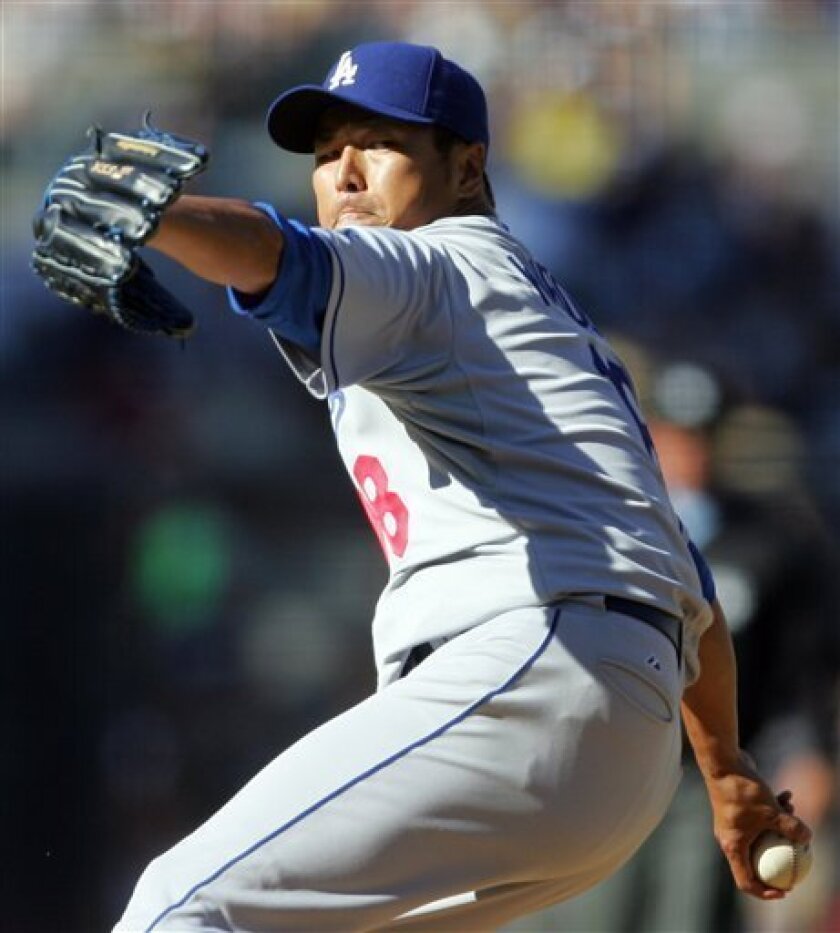 Los Angeles Dodgers starter Hiroki Kuroda pitches against the San Diego Padres in the first inning of a baseball game in San Diego, Monday, April 6, 2009. (AP Photo/Lenny Ignelzi)