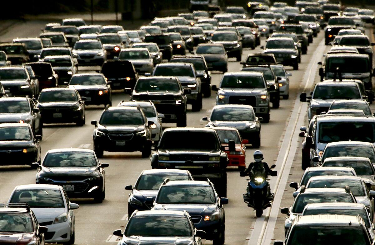 Dense traffic streams down a freeway