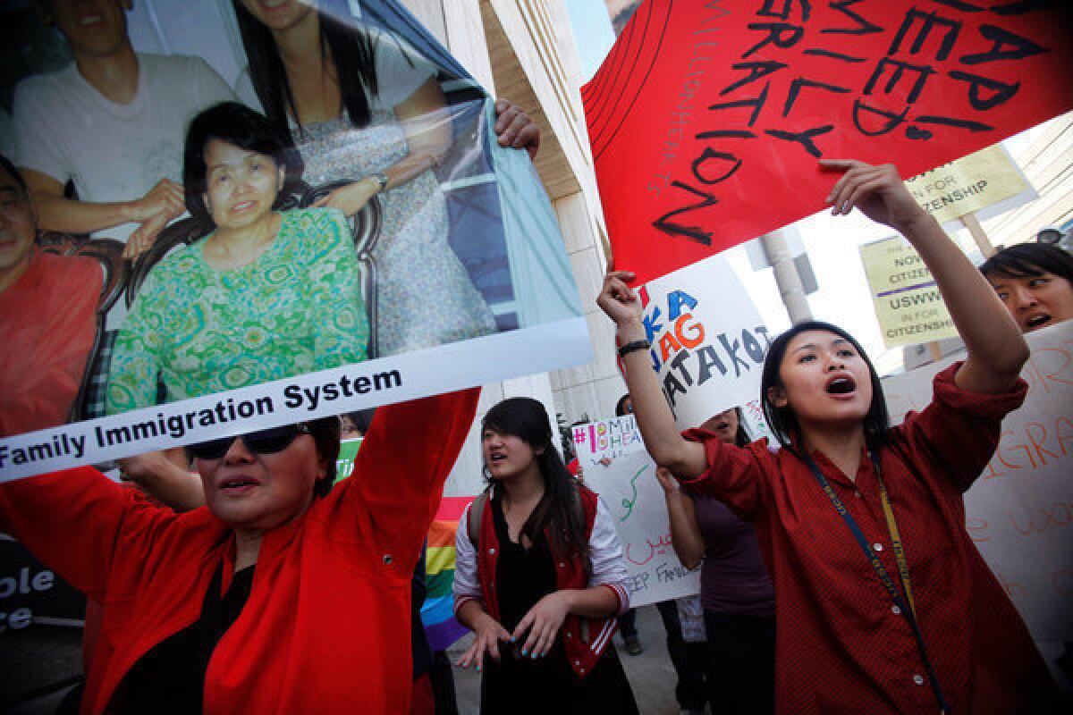 Activists rally for immigration reform in front of the West Los Angeles office of Sen. Dianne Feinstein.