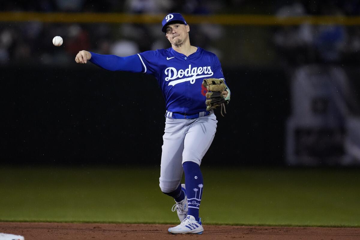 Dodgers second baseman Kiké Hernández warms up before a spring training game against the San Francisco Giants 