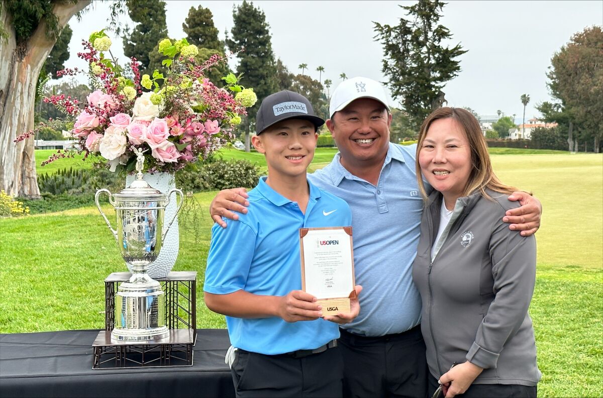 Jaden Soong, 13, poses for a photo with his parents, Chris and Sandra.