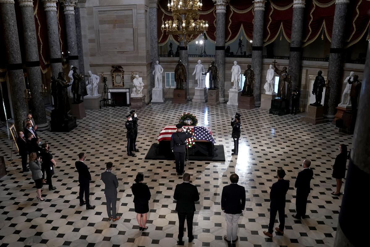 Capitol Hill staffers pay their respects as the late Justice Ruth Bader Ginsburg lies in state.
