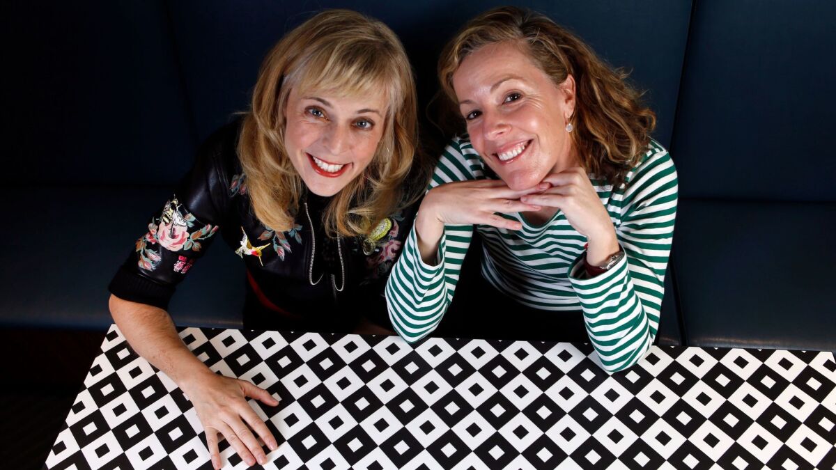 Maria Bamford, left, the star of the Netflix series "Lady Dynamite," with show runner and co-creator Pam Brady, at the Netflix offices in Hollywood.