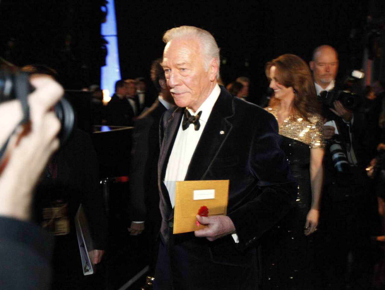 Christopher Plummer walks backstage after receiving his first Academy Award for his supporting role in "Beginners."