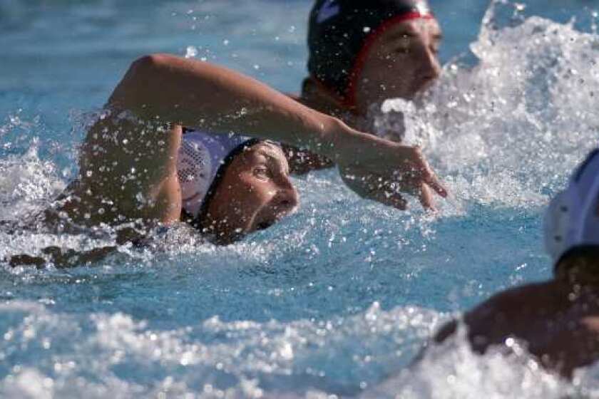 U.S. water polo standout Tony Azevedo sprints back on offensive during practice at Cal Lutheran University last year.