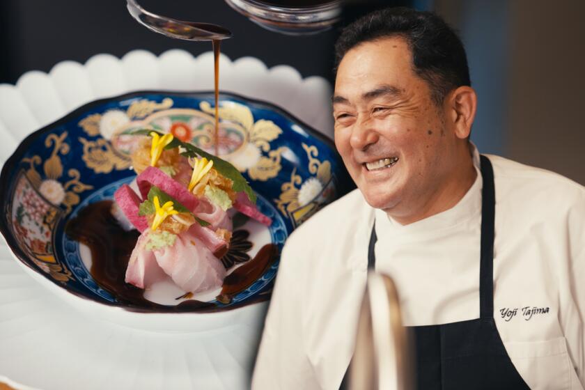 Yoji Tajima aside a plate of sashimi