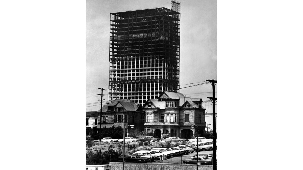May 12, 1966: The skeleton of the 40-story Union Bank Square building rises over Bunker Hill Victorians in downtown Los Angeles.