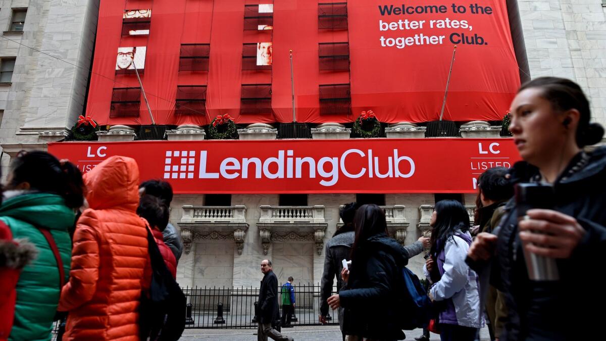 Banners promoting online lender LendingClub hang on the facade of the New York Stock Exchange in 2014.