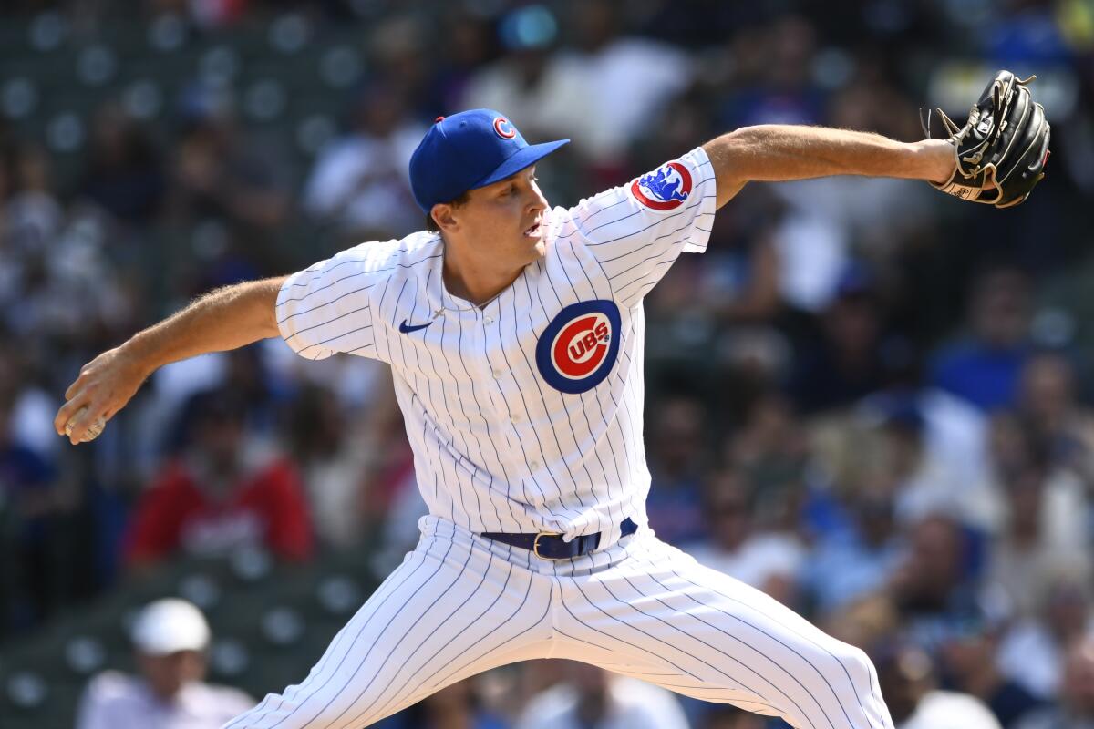 Chicago Cubs starter Hayden Wesneski delivers a pitch during the first inning of a baseball game against the Colorado Rockies Saturday, Sept. 17, 2022, in Chicago. (AP Photo/Paul Beaty)