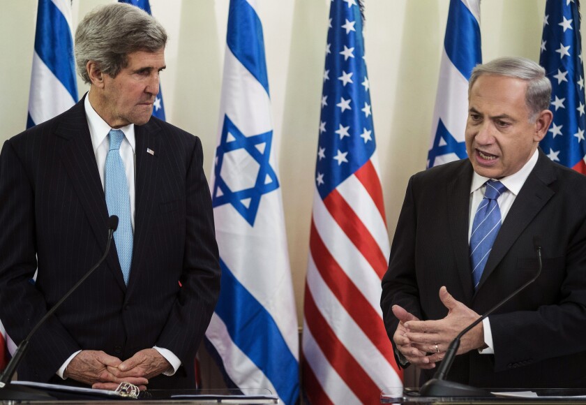 Secretary of State John F. Kerry, left, at a news conference with Israeli Prime Minister Benjamin Netanyahu in January, has drawn fire for reportedly saying Israel could become an apartheid state if it doesn't agree to peace with the Palestinians.
