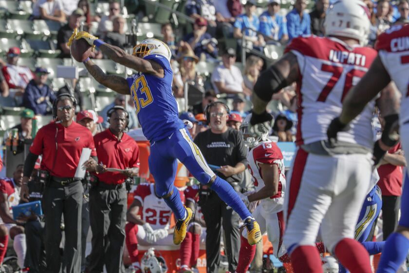 Chargers safety Derwin James intercepts a pass from Arizona Cardinals quarterback Josh Rosen in the second quarter at StubHub Center.