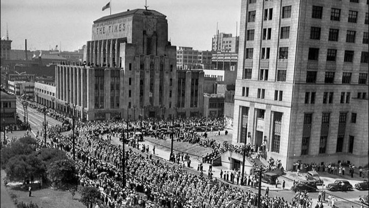 Sept. 6, 1937: About 50,000 workers marched in the Labor Day parade in downtown L.A. In this photo, the old L.A. Times Building is on the left and now-demolished State Building is seen on the right.