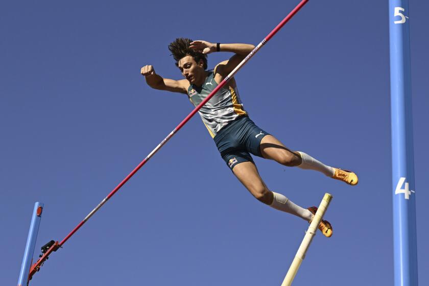 Sweden's Armand Duplantis competes during the men's pole vault comptetition at the Diamond League Bauhaus Athletics Gala in Stockholm, Sweden, Sunday, June 2, 2024. (Anders Wiklund/TT News Agency via AP)