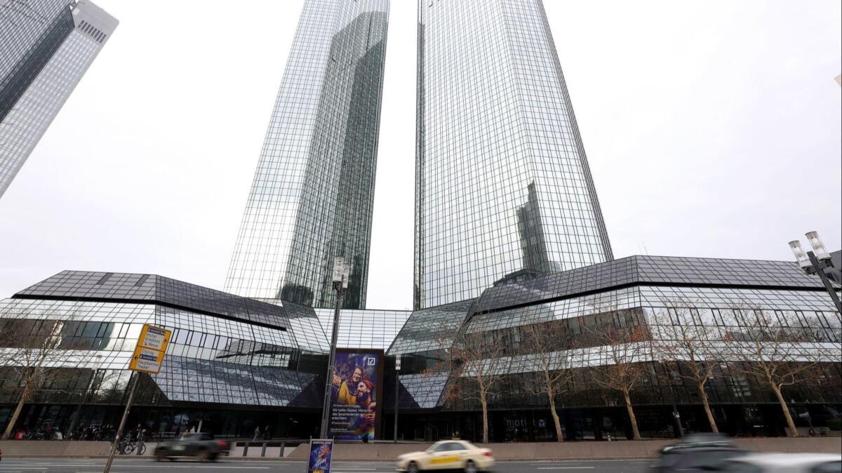Deutsche Bank's headquarters in Frankfurt, Germany, shown last week, were raided by German authorities Thursday in connection with a money-laundering investigation prompted by disclosures in the Panama Papers.