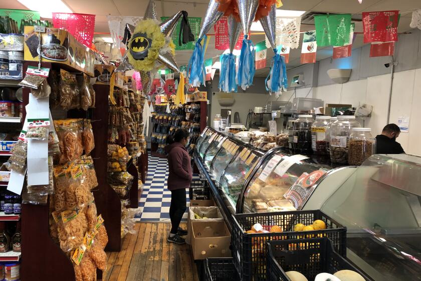 Immigrants shop at M.M. San Juan's Mexican Grocery Store in Arcadia, Wis.