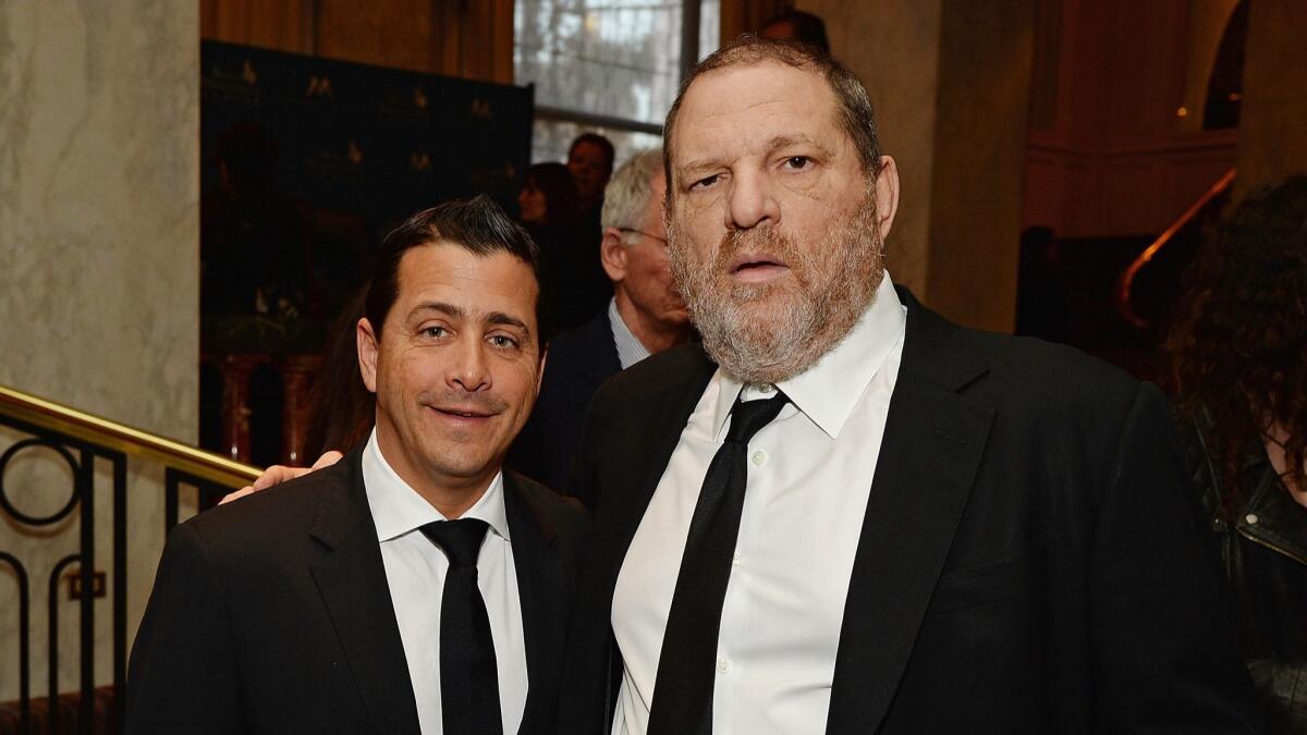 The Weinstein Company COO David Glasser, left, pictured with Harvey Weinstein in 2014.