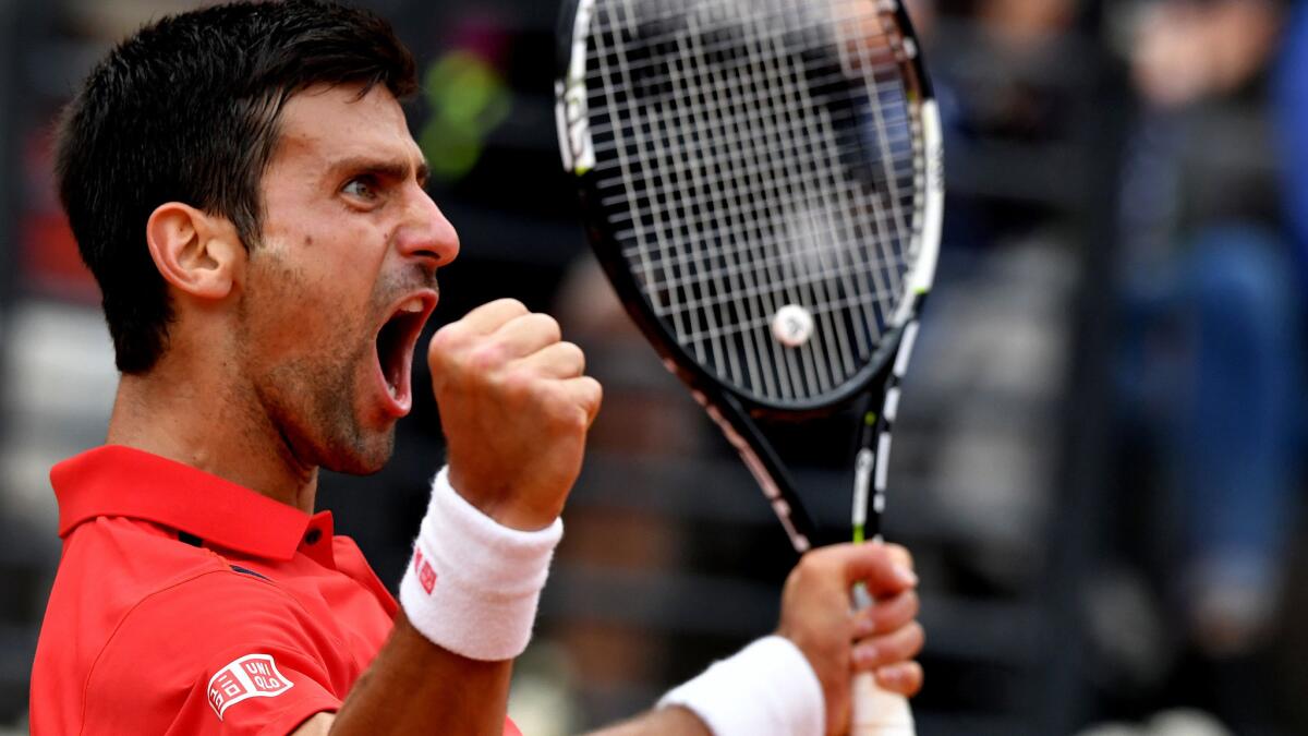 Novak Djokovic reacts after winning a point against Rafael Nadal during a quarterfinal match at the Italian Open on Friday.