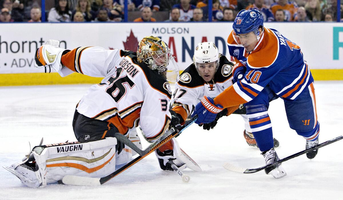 Ducks goalie John Gibson makes a save on a shot by Oilers winger Nail Yakupov during a game March 28, 2016.