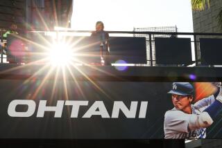 LOS ANGELES, CA - DECEMBER 14: Digital signs of Shohei Ohtani are displayed at the center field plaza before the Los Angeles Dodgers introduce Ohtani as the newest member of the team during a press conference at Dodger Stadium in Los Angeles Thursday, Dec. 14, 2023. The Dodgers signed Ohtani to a 10-year $700 million contract on a blockbuster free agency signing. (Wally Skalij / Los Angeles Times)
