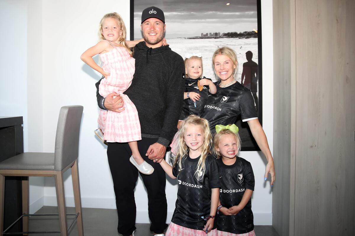 Rams quarterback Matthew Stafford and his wife, Kelly, attend an Angel City FC game with their four daughters in May 2022.