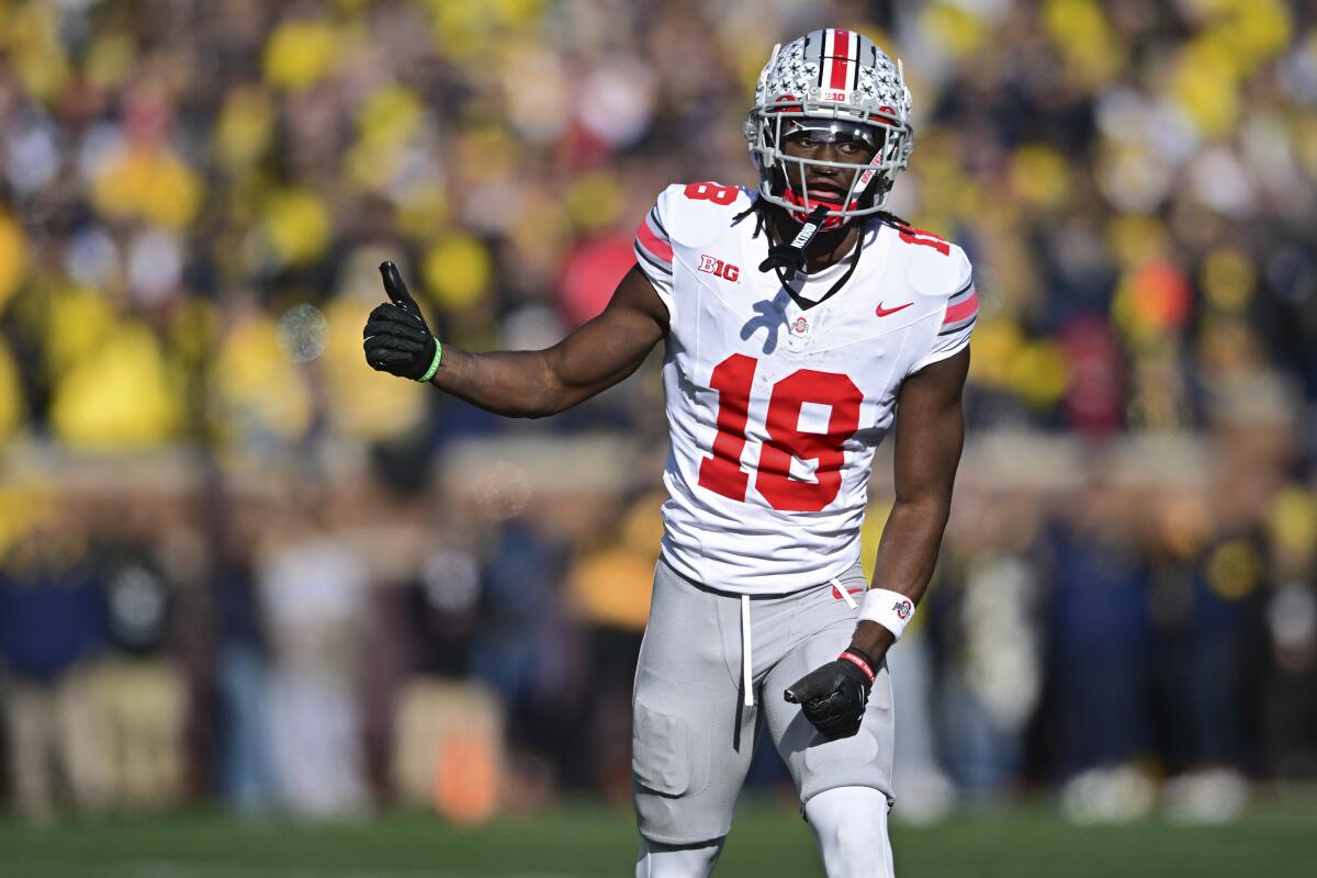 Ohio State wide receiver Marvin Harrison Jr. lines up against Michigan.