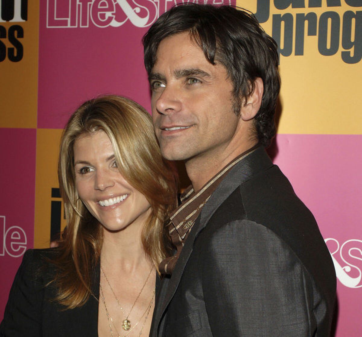 "Full House" stars Lori Loughlin and John Stamos, shown in 2006, said their romance "timing was off" while filming their sitcom.