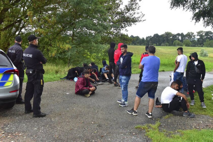 Czech police carries out random checks near the Czech-Slovak border and on busy roads in the interior parts in the Czech Republic. Police detained 22 illegal migrants in Rohatec (pictured), Czech Republic, Sept. 15, 2022. The Czech government decided to temporarily reintroduce checks at the border with Slovakia over illegal migration as of Thursday. (CTK via AP/Vaclav Salek)