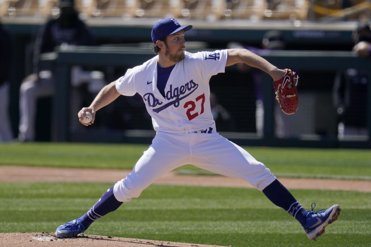 Dodgers pitcher Trevor Bauer throws against the Colorado Rockies.