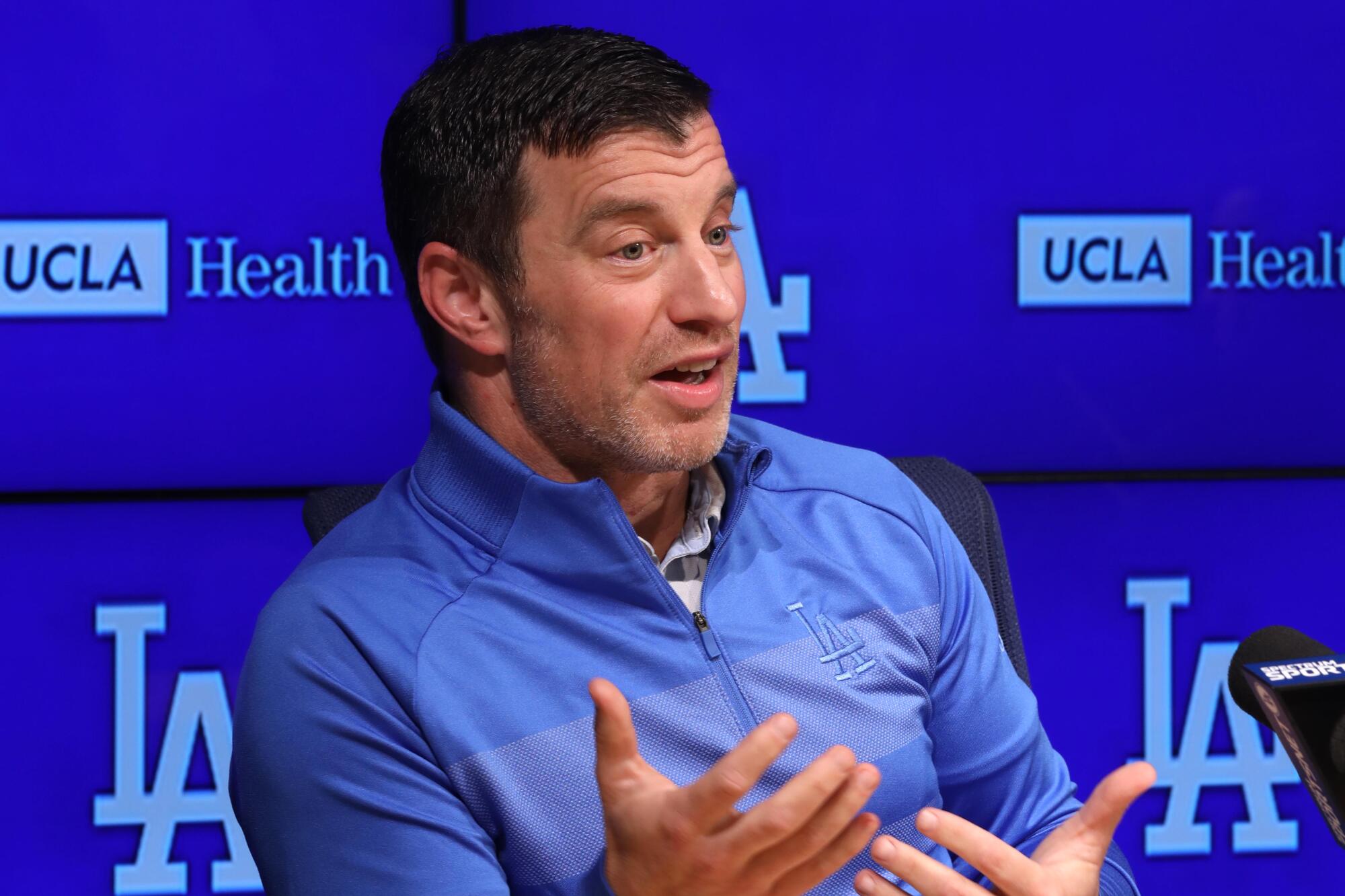 Andrew Friedman speaks during a news conference.