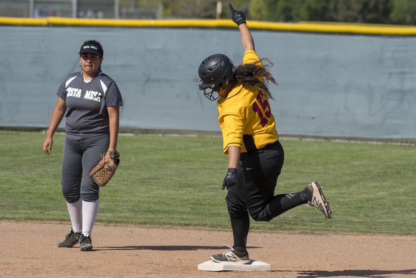 Estancia's Kyra Avila rounds second after hitting a three-run homerun in the fourth inning against Costa Mesa on Monday, April 9.