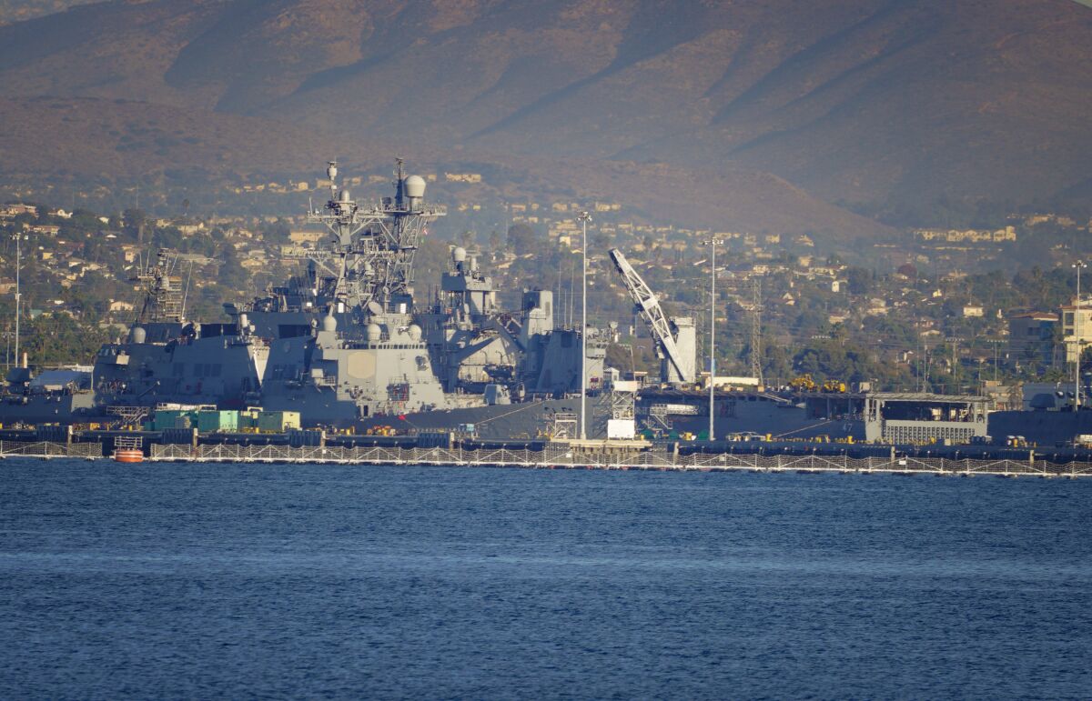 A view of the USS Rushmore (right) docked at Naval Base San Diego