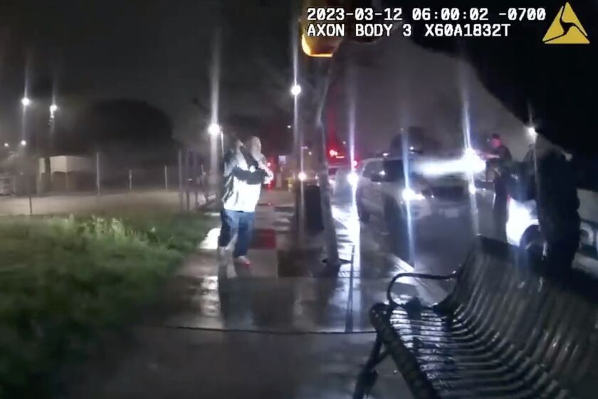 Body camera footage shows Adam Barcenas approaching police with a steel bar during a DUI traffic stop.