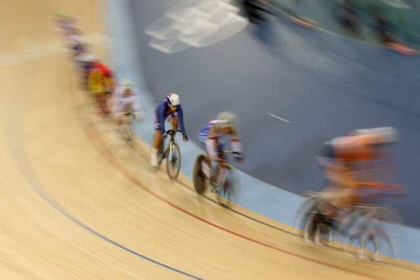 Sarah Hammer, center, of the U.S. competes in the women's omnium 10-kilometer scratch race.