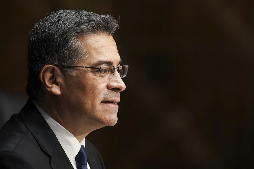 Xavier Becerra testifies during a hearing on his nomination 
