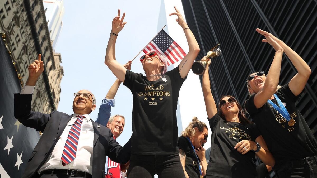 Megan Rapinoe celebrates at the U.S. women's national soccer team victory parade.