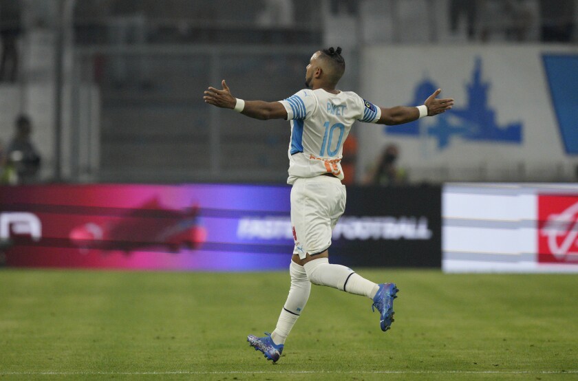 Marseille's Dimitri Payet celebrates after scoring his side's second goal during the French League One soccer match between Marseille and Bordeaux at the Velodrome stadium in Marseille, southern France, Sunday, Aug. 15, 2021. (AP Photo/Daniel Cole)