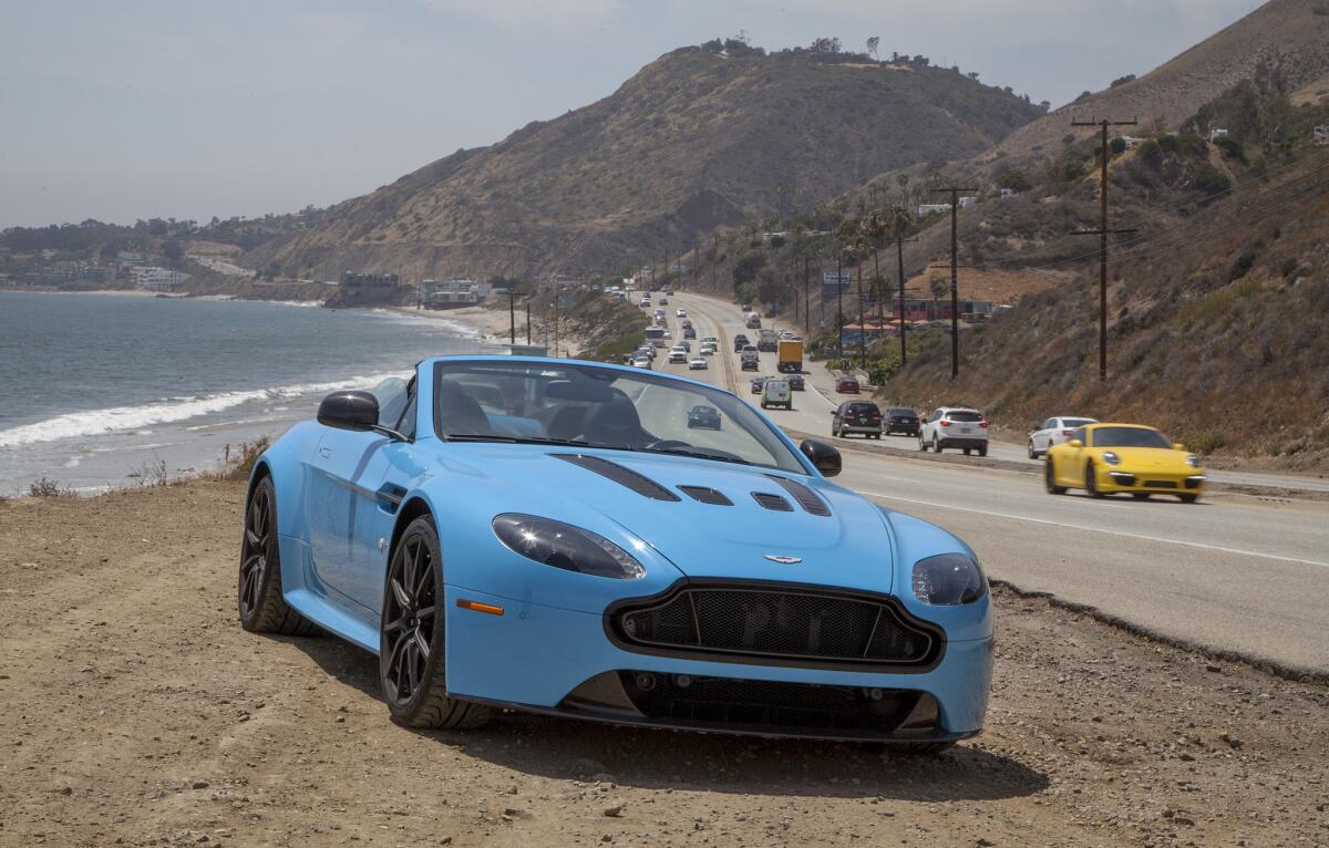 A bright blue Aston Martin V12 Vantage S convertible is the car of choice for Charles Fleming on his L.A. Drive through Topanga Canyon, the Santa Monica Mountains and Malibu.