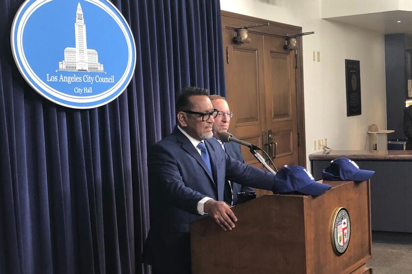 Councilmen Gil Cedillo and Paul Koertz address the media Tuesday morning regarding their resolution to request MLB to award the Los Angeles Dodgers the 2017 and 2018 World Series championships.