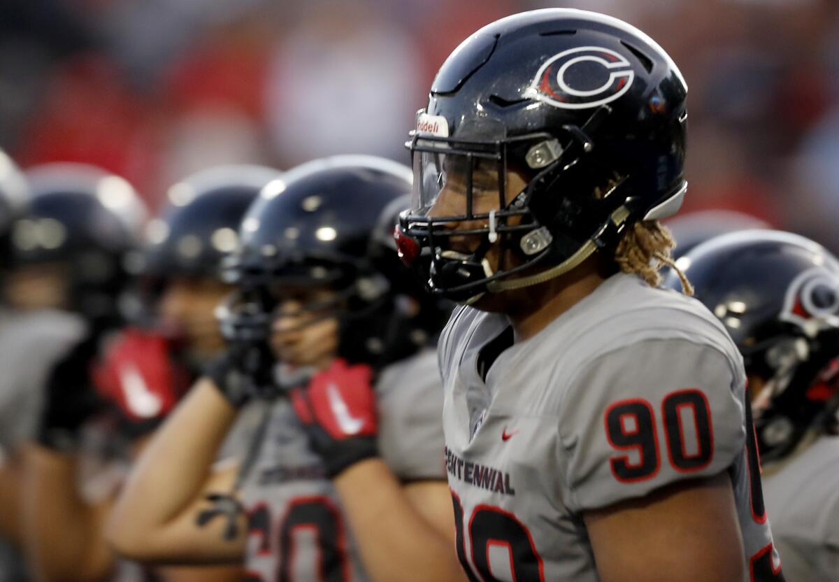 Corona Centennial defensive end Korey Foreman warms up before a game at Santa Ana Stadium.