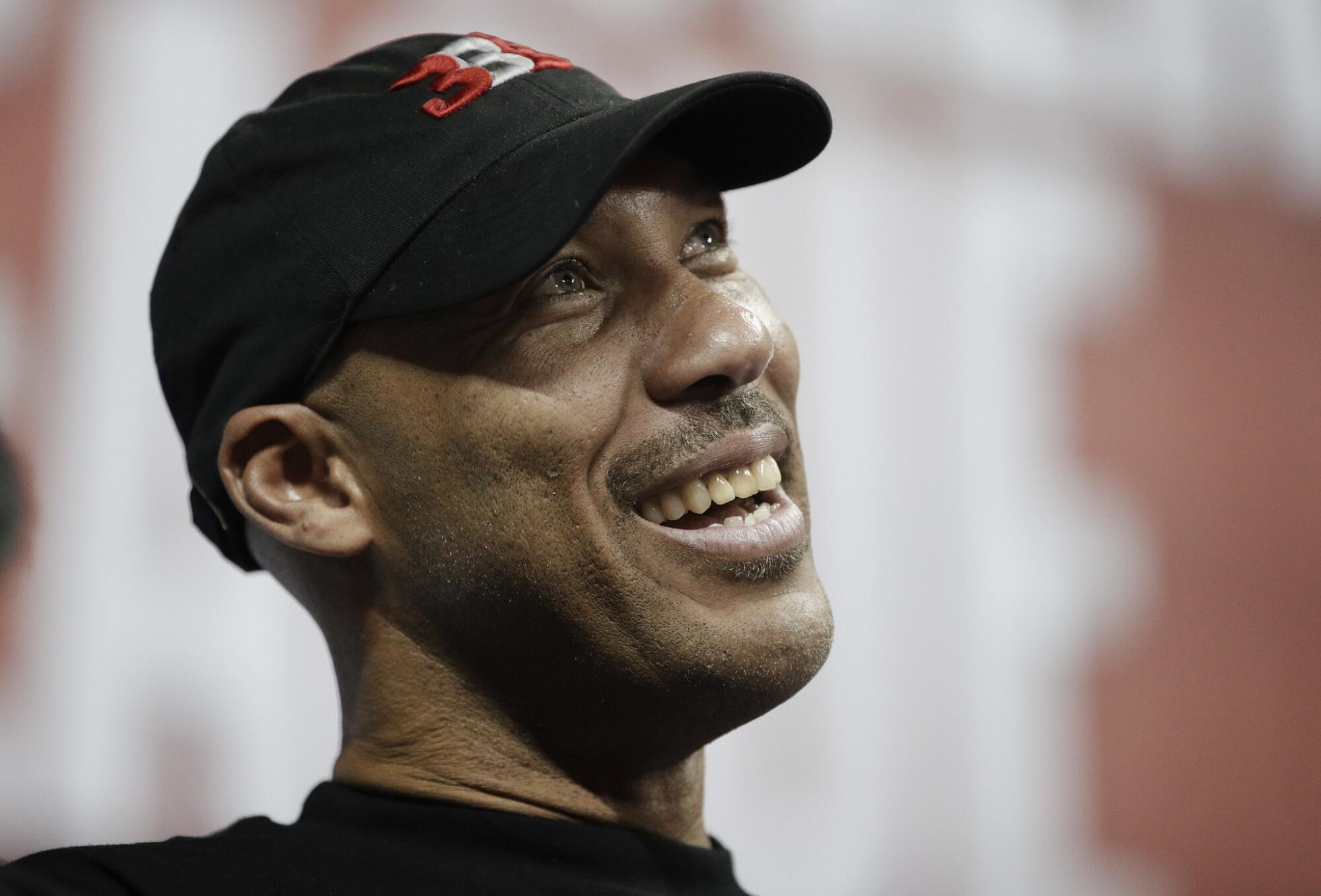 LaVar Ball watches a Lakers game.