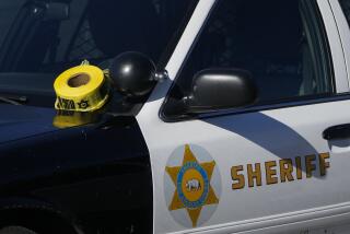 A roll of police tape is left on the windshield of Los Angeles County sheriff's vehicle in the parking lot of its training academy in Whittier, Calif., Wednesday, Nov. 16, 2022. A car struck 22 LA County sheriff's recruits on a training run around dawn Wednesday and five were critically injured, authorities said. (AP Photo/Jae C. Hong)