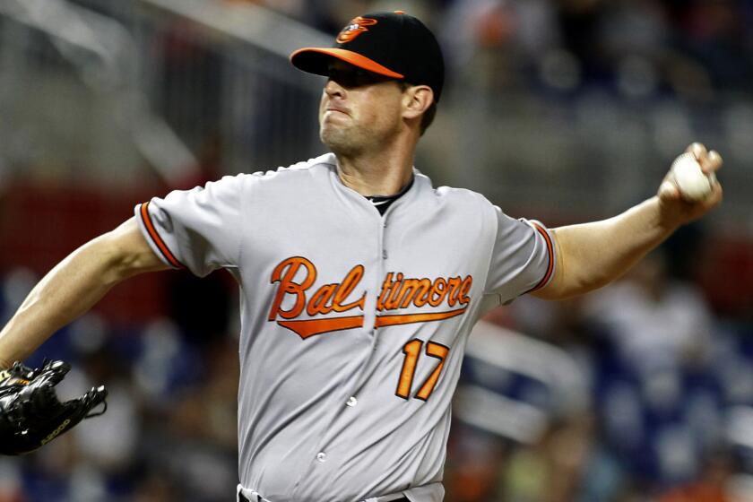 Baltimore Orioles reliever Brian Matusz delivers a pitch during the 12th inning of the team's 1-0 loss to the Miami Marlins on May 23.